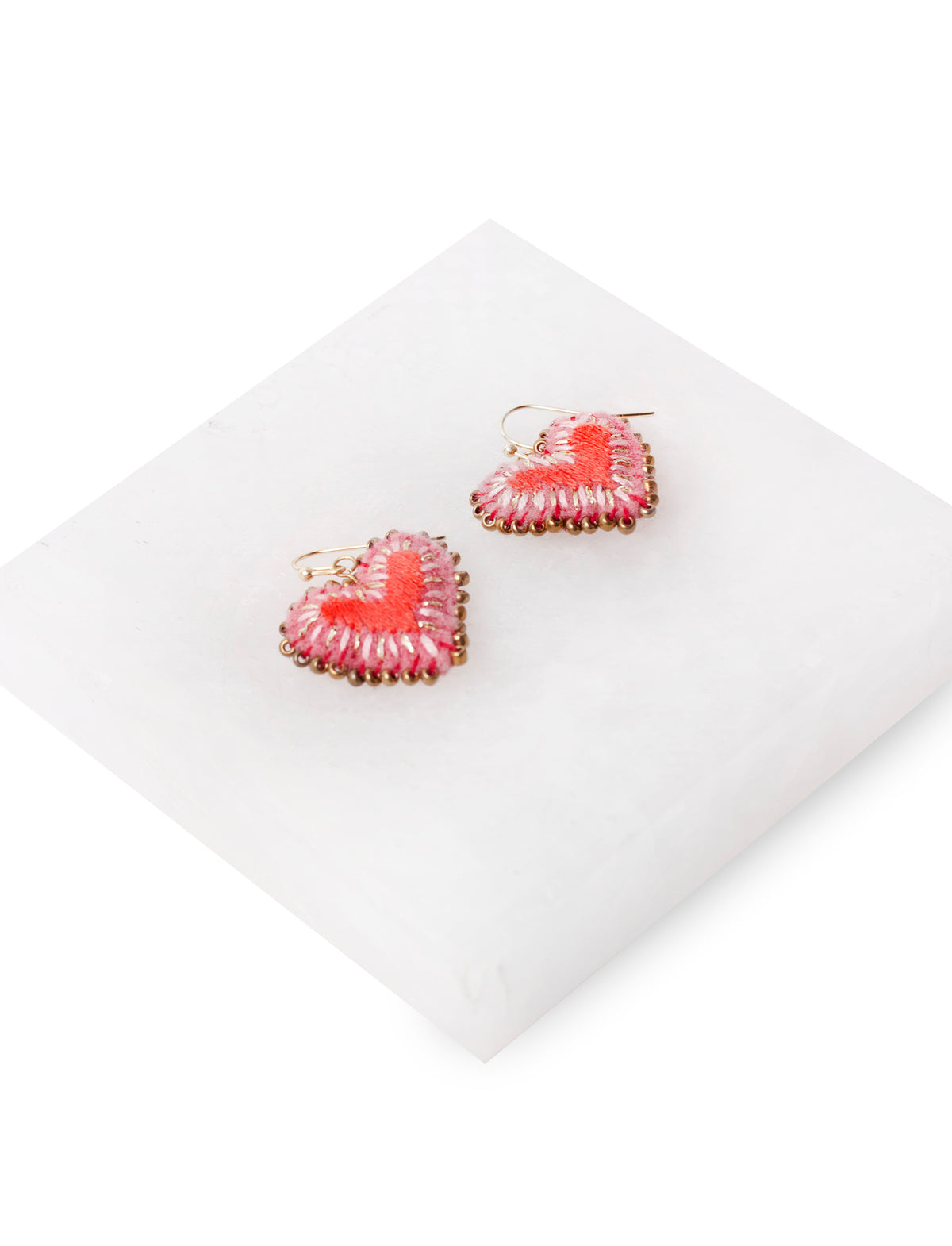 Aretes Ami
